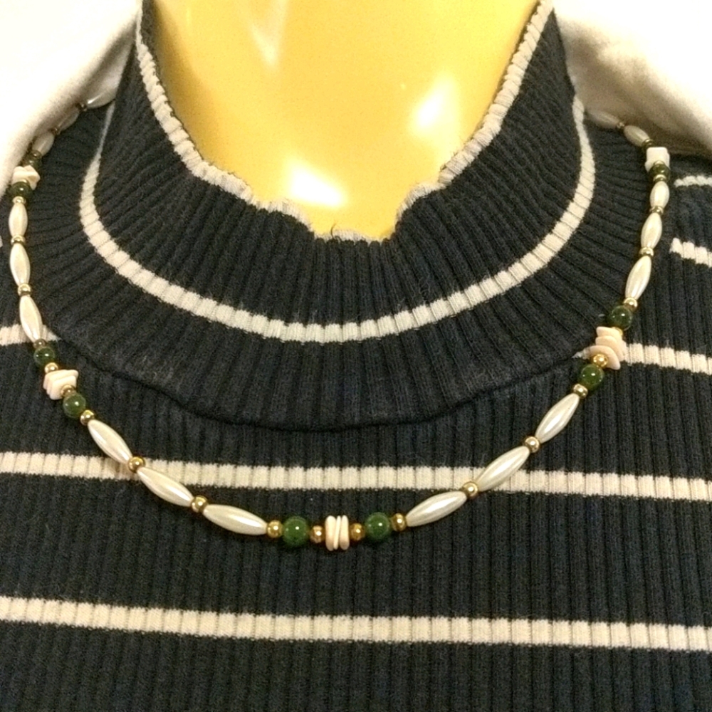 Woman faux pearl, jade, and coral necklace